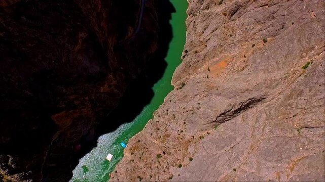 Extreme Jump from Canyon Platform into River with Parachute Deployment, Aerial View
