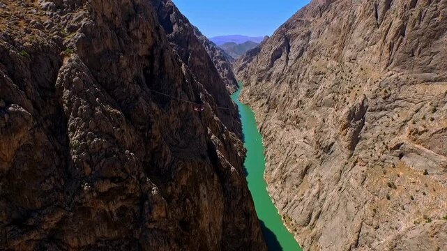 Adrenaline Sports Scene with River Jump and Parachute Opening