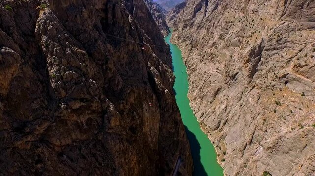Adrenaline Sports Scene with River Jump and Parachute Opening