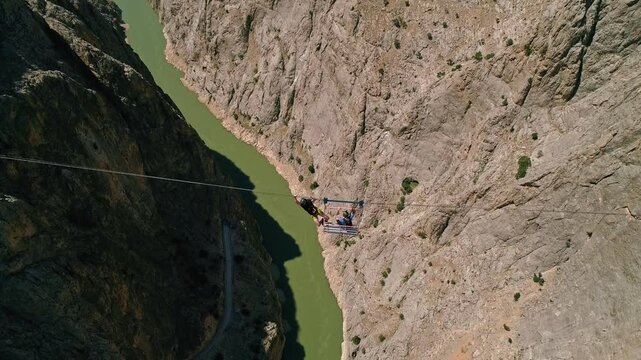 Adrenaline Sports Scene with River Jump and Parachute Opening