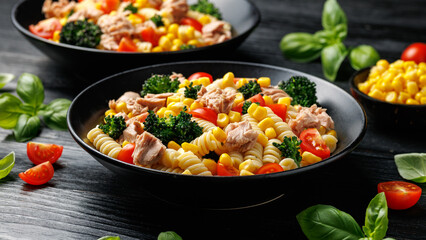 Tuna corn pasta salad with tomatoes and broccoli