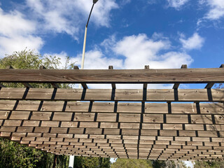 old wood cieling with blue sky