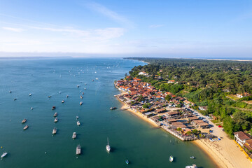 Cap-Ferret, France. Boats seen from an oyster village on the Bay of Arcachon