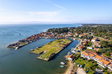 Cap-Ferret, France. Boats seen from an oyster village on the Bay of Arcachon