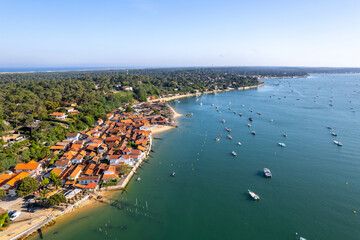 Cap-Ferret, France. Boats seen from an oyster village on the Bay of Arcachon