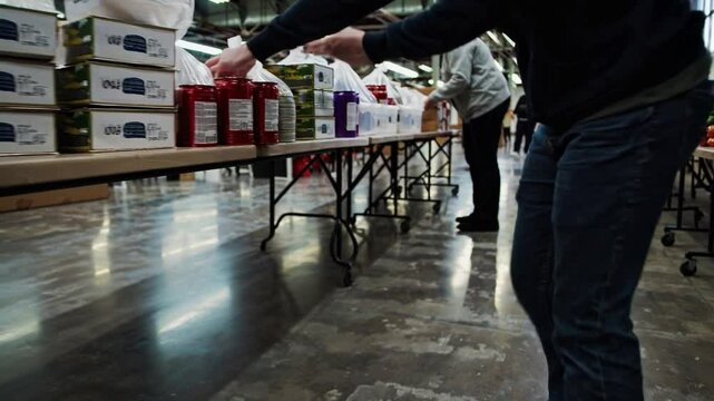 Groceries and Supplies Stacked for Charity Donation Drive
