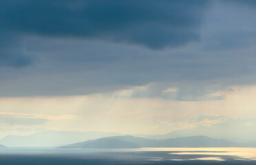 Sunset sky. Dramatic sky view. Sunlight over the sea