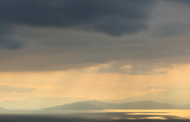 Sunset sky. Dramatic sky view. Sunlight over the sea