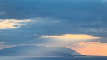 Sunset sky. Dramatic sky view. Sunlight over the sea
