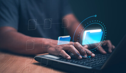 Document management system or DMS, Managing corporate files. Businessman using laptop computer for manage information, Online documentation database and process to efficiently manage files.