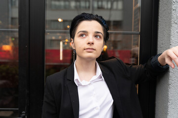 Portrait of young businesswoman in suit