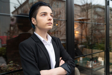Portrait of young businesswoman in suit