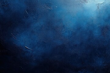 Obraz premium Dark textured blue surface with various shades creating an abstract and moody background
