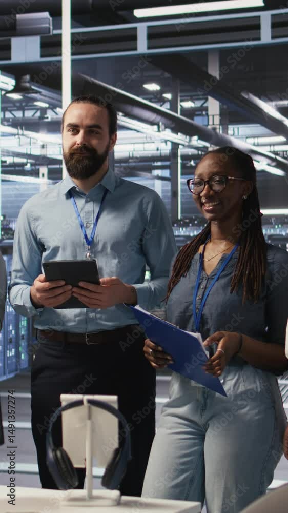Poster vertical video happy data center engineering team members collaborating on neural network software d