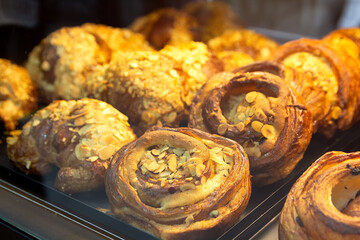 Delicious pastries on a bakery window close-up