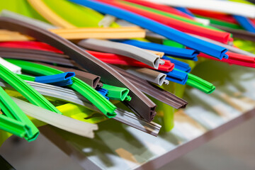 Color extruded rubber profile, seal for doors and windows