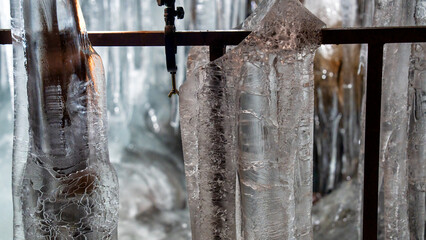 Frozen ice cave in Kawaguchiko, Japan, showcasing intricate ice stalactites and unique textures