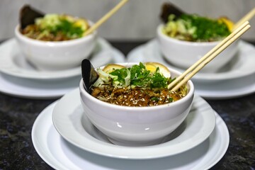 Traditional Japanese ramen or ramen with vegetable broth, grilled pork, oriental noodles and classic Japanese cuisine spices