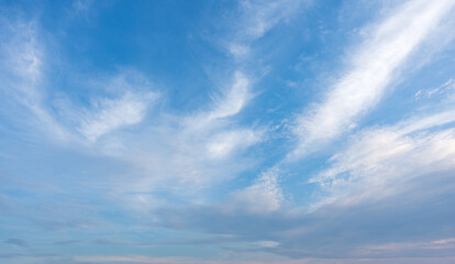 Obraz premium Blue sky with soft white clouds background