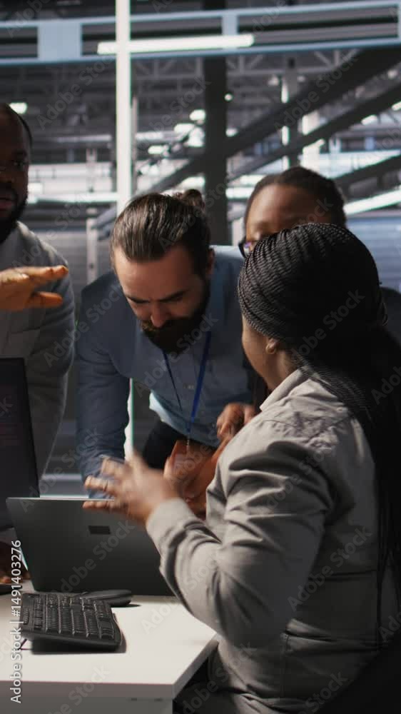 Poster vertical video engineering team in data center panicking after receiving critical error popup on pc 