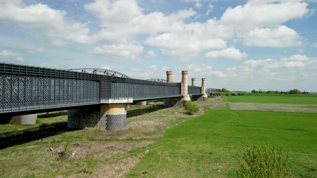 The Tczew bridge was 837 m long and back to 1857 it was the longest one in Europe. It had 10 towers (two on each pillar) and impressive entry gates. Poland. 4k, high quality video, drone footage.