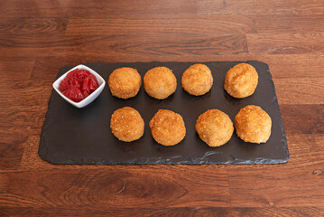 Béchamel, the white sauce made with milk, flour, and butter, is the base of many croquettes