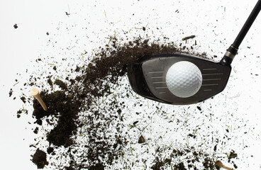 Golf ball explode from Tee off. Golfer hit ball with club to grass soil explosion on green. Golf club hit ball on green tee off with grass flying scatter. White background isolated