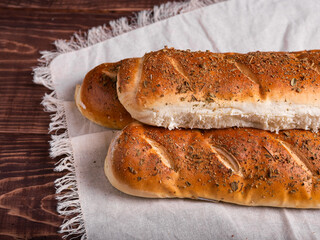 Artisan Herb-Crusted Bread on Rustic Wood
