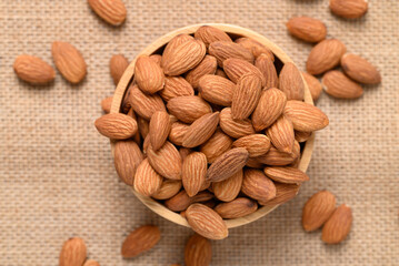 Raw almond nut seed in bowl, Food ingredient, Top view