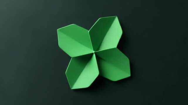 Green bold spin hexagonal star simple flat geometric on dark grey black background loop.