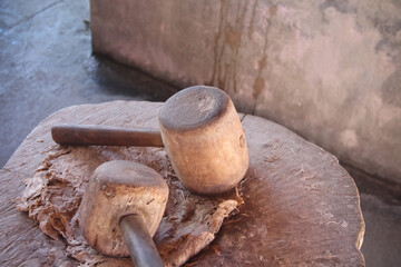 Close up wood hammer with handle for smash dry broussonetia papyrifera the step to make sa paper mulberry