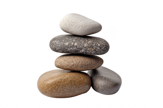 Balanced natural smooth stones stacked in a zen-like arrangement isolated on a transparent background