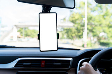 Smartphone with blank white screen on car mount while driving