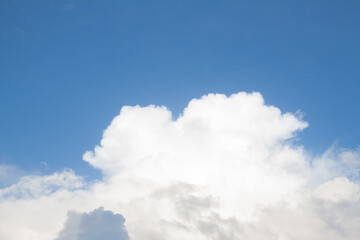 Obraz premium Blue sky with soft white clouds for background