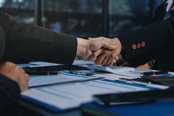 Business handshake for teamwork of business merger and acquisition,successful negotiate,hand...