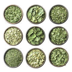 Nine bowls of dried herbs and spices various cuts and textures