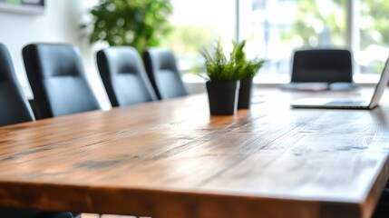 Modern conference room with wooden table and laptop for business meeting or presentation