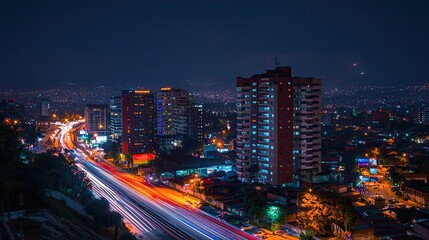 Obraz premium City lights blurring highway at night