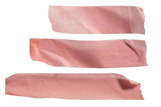Pieces of pink masking tapes in different length