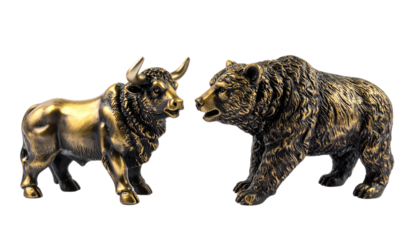 Bronze bull and bear figurines face each other, symbolizing opposing market trends in finance.