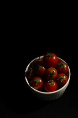 Cherry Tomatoes in Ceramic Bowl on Black Background – Minimalist Food Photography