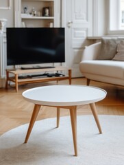 Minimalist Living Room Interior Design featuring Round White Coffee Table on Rug in Modern Home