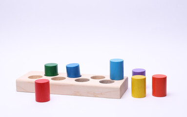 Children's wooden educational toy for baby on white background