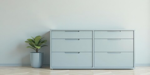 Serene Minimalist Bedroom Design Featuring Light Blue Chest of Drawers and Potted Plant