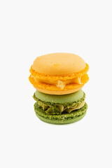 Colorful macarons stacked in a tempting dessert display