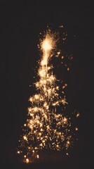 Close-up of a glowing Christmas tree with colorful lights against a dark background at night.