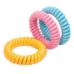Close up showcases three colorful spiral hair bands, pink, yellow, blue, on transparent background