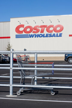 Ridgefield, WA, USA - Dec 4, 2024: An empty shopping cart returned by a shopper to the cart corral in the parking lot outside of a newly-opened Costco store in Ridgefield, Washington.