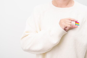 Pansexual Visibility Day and Panromantic May Awareness Day and LGBT pride month concept. hand holding pink, yellow and blue heart shape for Lesbian, Gay, Bisexual, Transgender and Marriage Equality