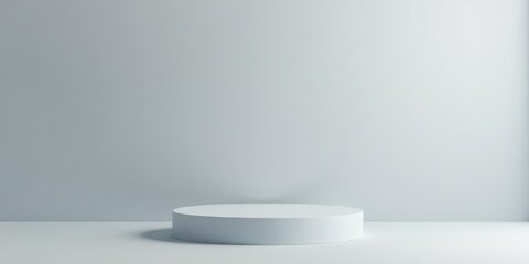 A Minimalist White Cylinder Platform Against a Light Grey Wall, Ideal for Product Displays or Conceptual Art Projects
